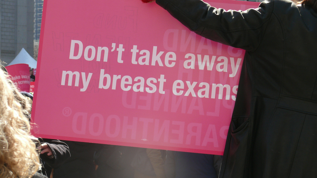 A demonstrator shows support for breast exams at a Planned Parenthood rally last year. Photo by Women's eNews. Creative Commons, some rights reserved.