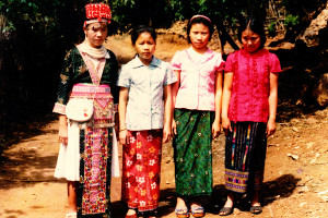 third from left in mountains of laos