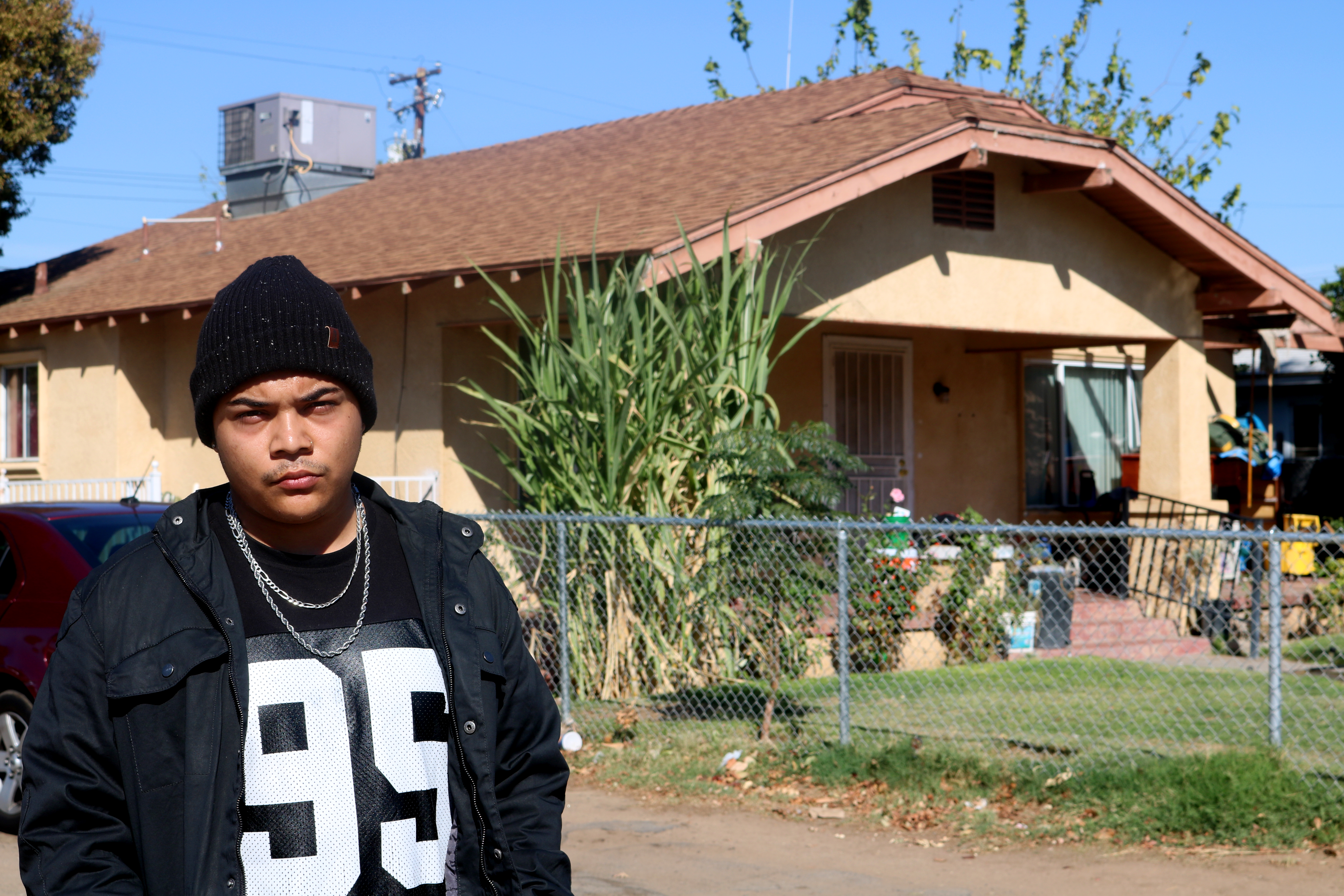 Reyna outside his childhood home. Among other renovations, what stood out most to him was the new paint and the fence around the property. 