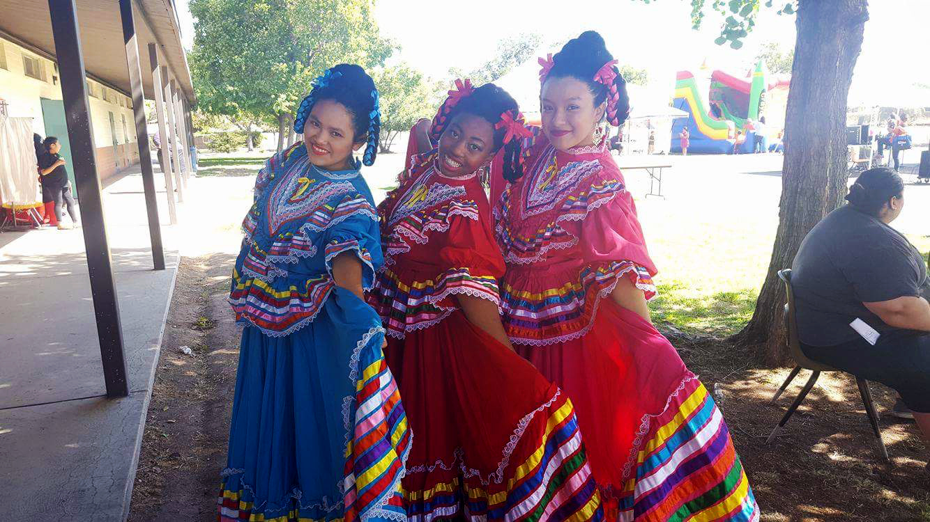 (From left) Alexis Rodriguez, Chaile Payne and Esmeralda Cabera-Rojas during the Sacred Heart Church’s Festival.